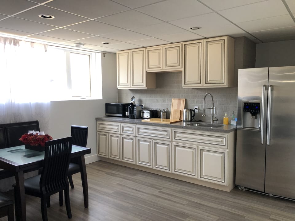 Kitchenette also has electric kettle, cutlery, plates, and bbq utensil