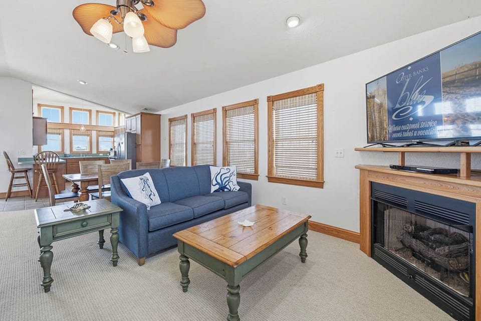 Top-Level Living Room with Deck Access