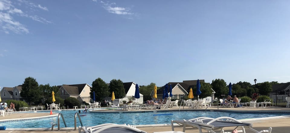 Pool with adult swim area and hot tub