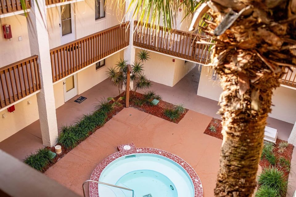 Walk out from your condo and see the jacuzzi down below. Enjoy till 11pm!