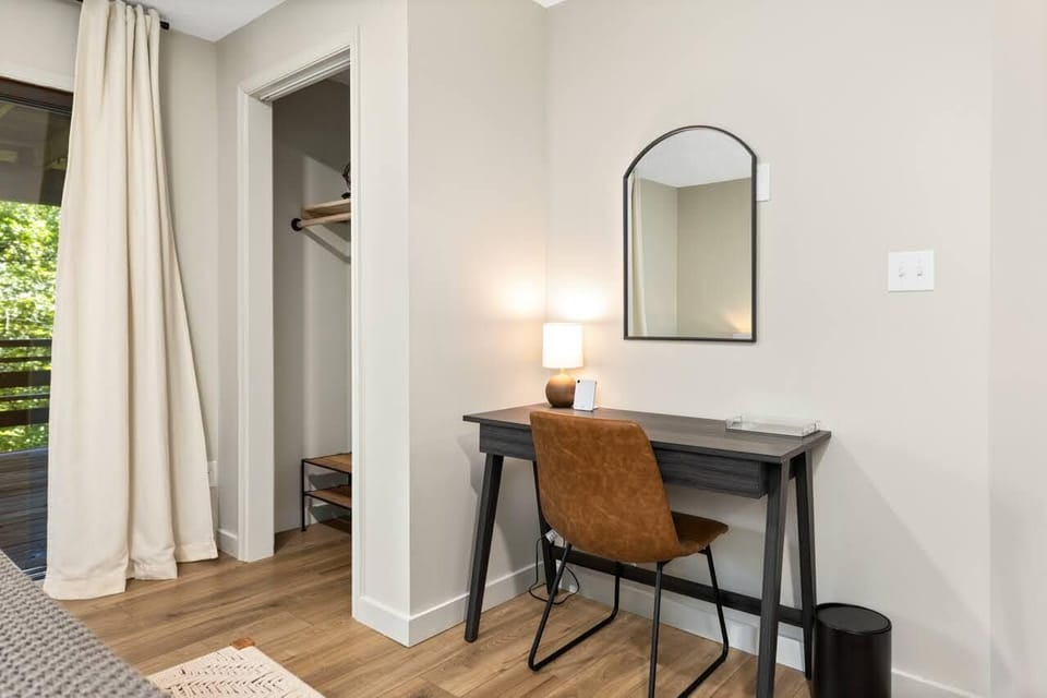 Workspace in lower level bedroom, and additional spot for guests to get ready