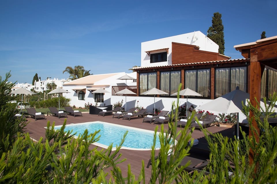 Relax while lounging around the on-site outdoor pool.