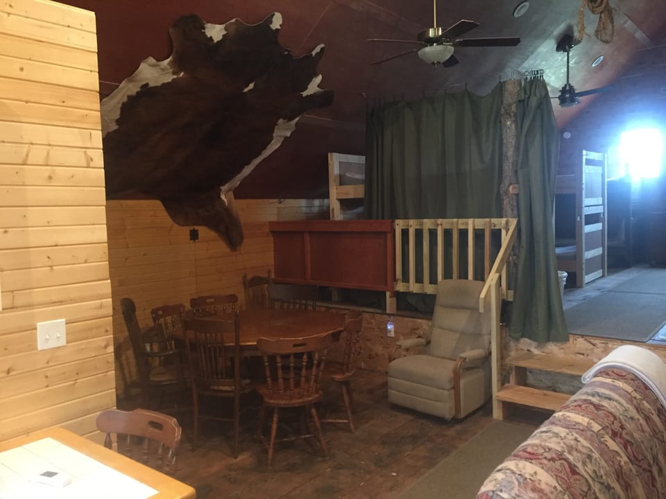 Dining room area with table that converts to card table.