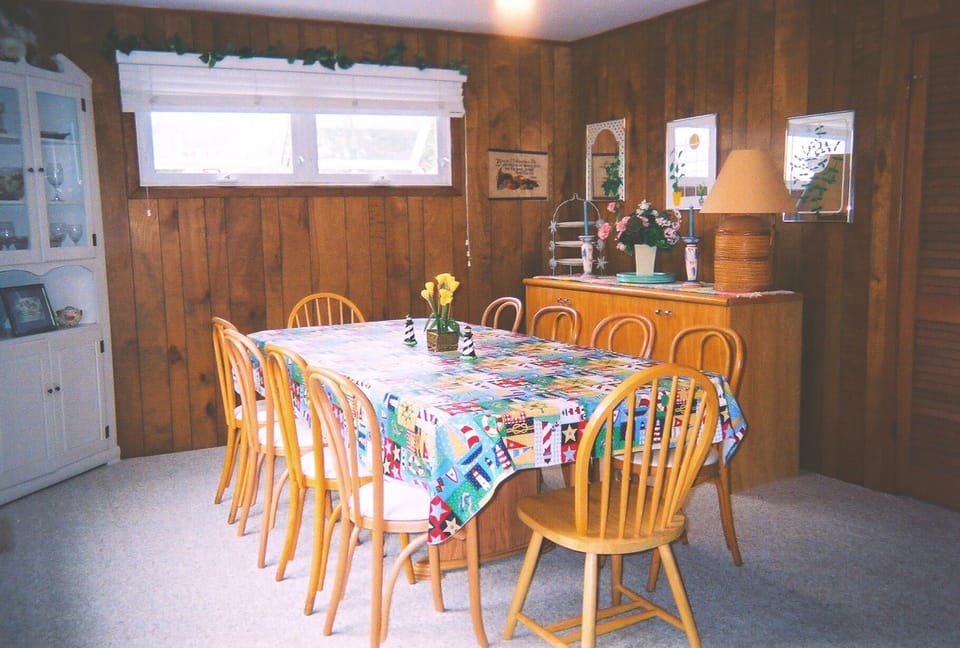 Next to the kitchen, our spacious Dining Room accommodates your entire family!