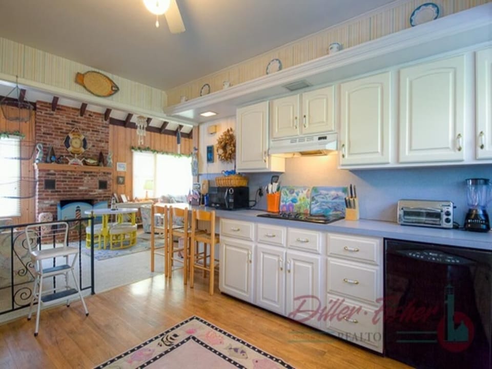 Fully-loaded kitchen with eating bar offers all the amenities of home!