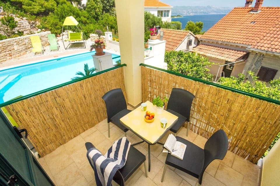 Balcony with pool view.