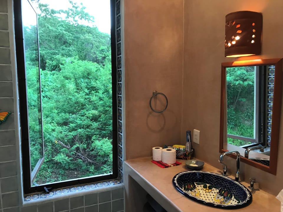 Blue bedroom in-suite bathroom