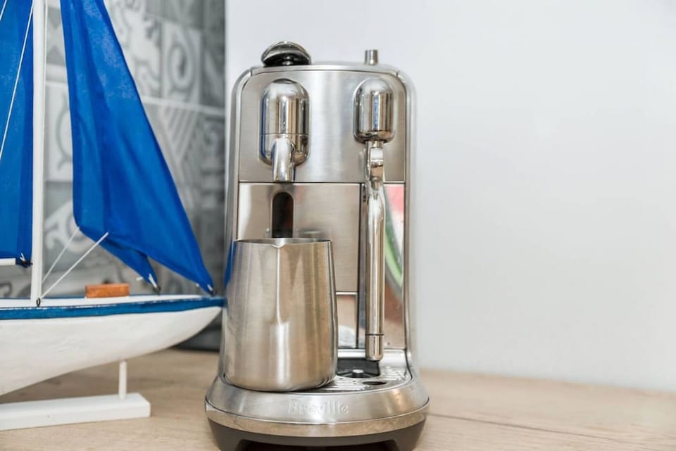 Start your mornings right with a cup of freshly brewed coffee from the Nespresso machine, perfect for enjoying in the comfort of your apartment as you relax and soak in the tropical vibes of Palm Cove.