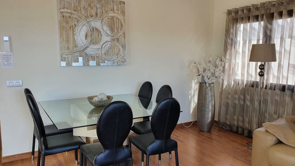 Design dining table and chairs in elegant design, Air con, wifi, 600Mbit OPTIC