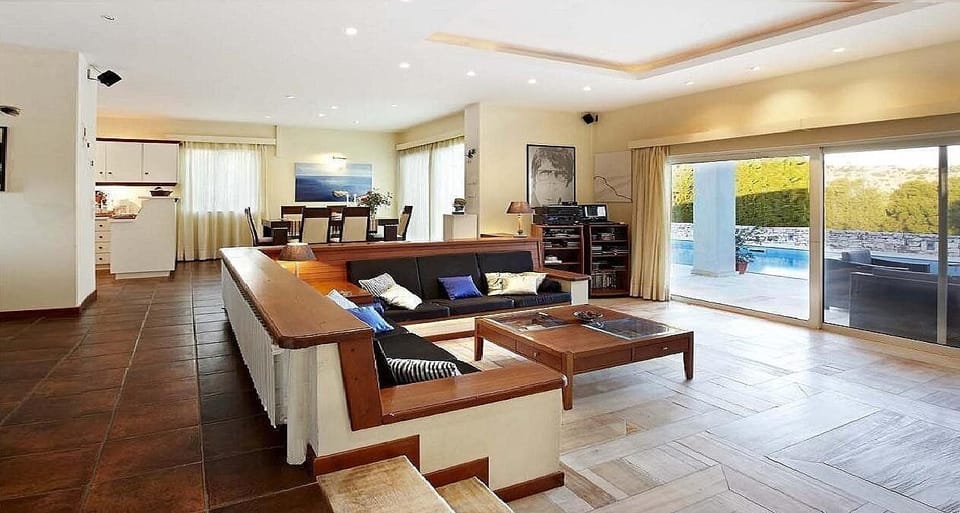2 level open plan sitting-dining-kitchen area.