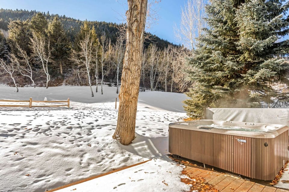 Soak away sore muscles in the new private hot tub!