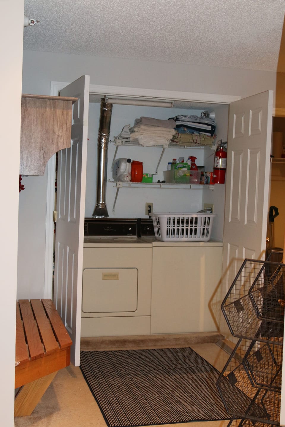 The laundry room is off the mudroom with a washer and dryer