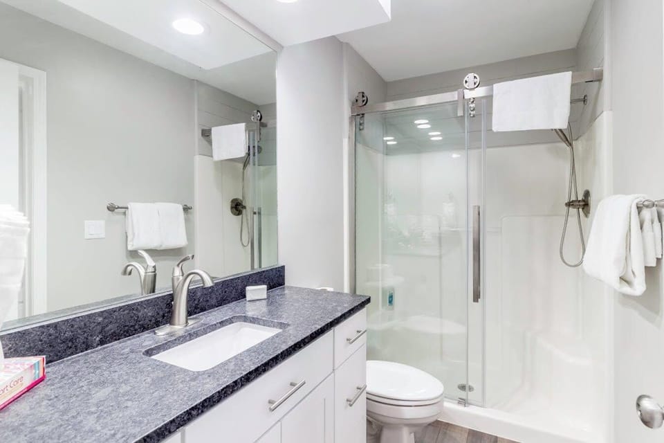 Bathroom with a walk-in shower.