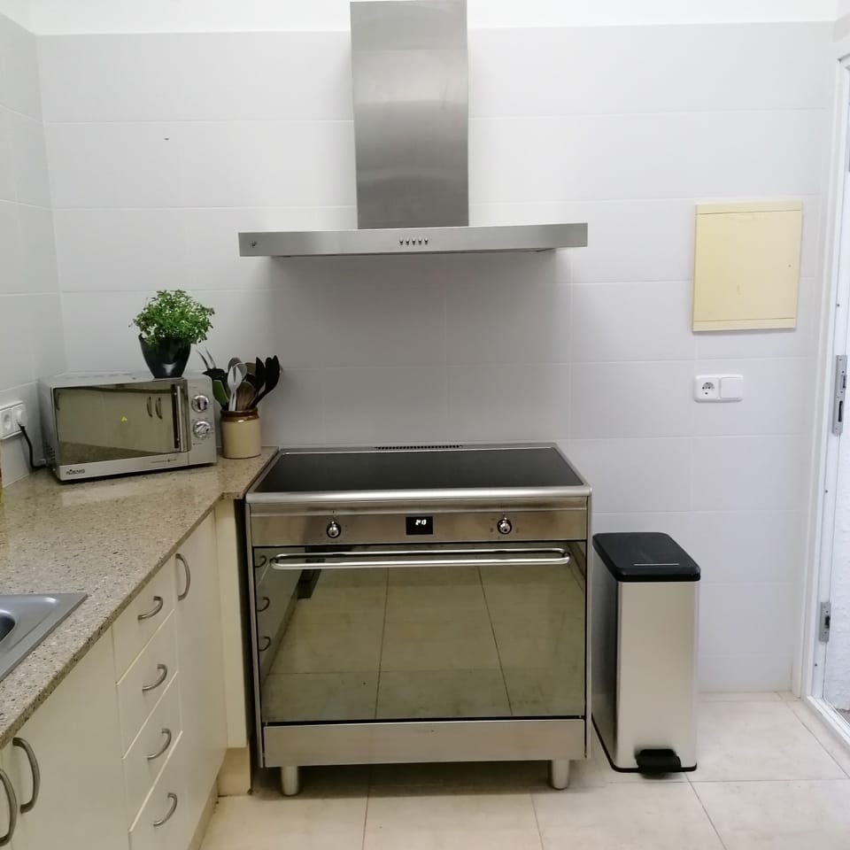 Kitchen with induction hob and large electric over
