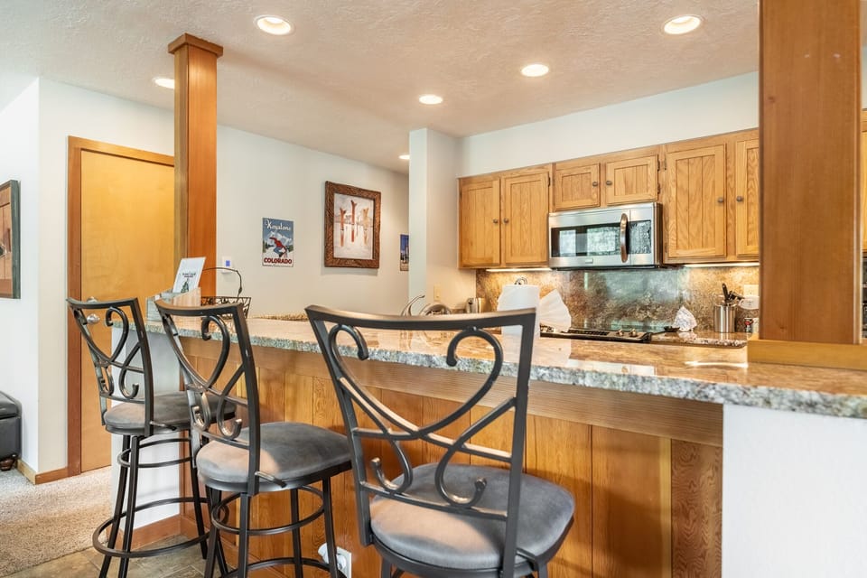 Breakfast bar with seating for three.