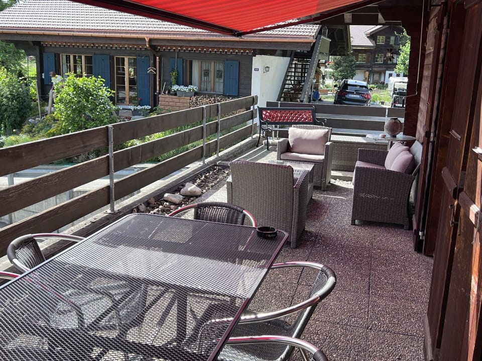 Building, Plant, Outdoor Furniture, Outdoor Table, Shade, Window, Motor Vehicle, House, Leisure, Chair