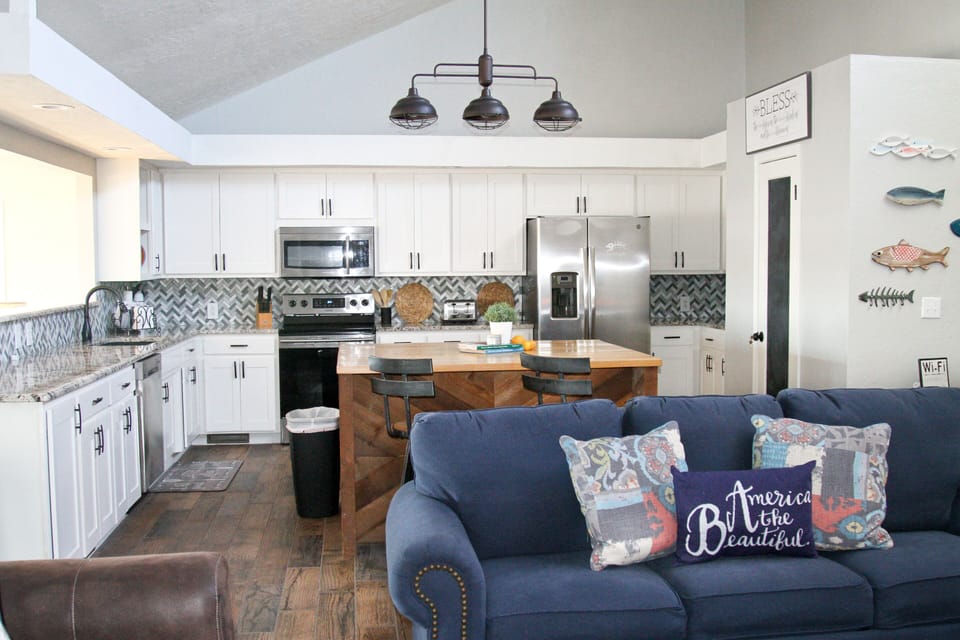 Large Kitchen. Stainless appliances. Granite counters. Big island. Lake views.