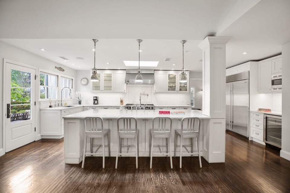 View of kitchen from great room. Watch some TV while cooking or enjoy the quiet.
