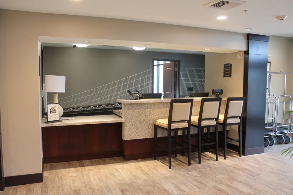 Front desk lobby area with seating and warm lighting.