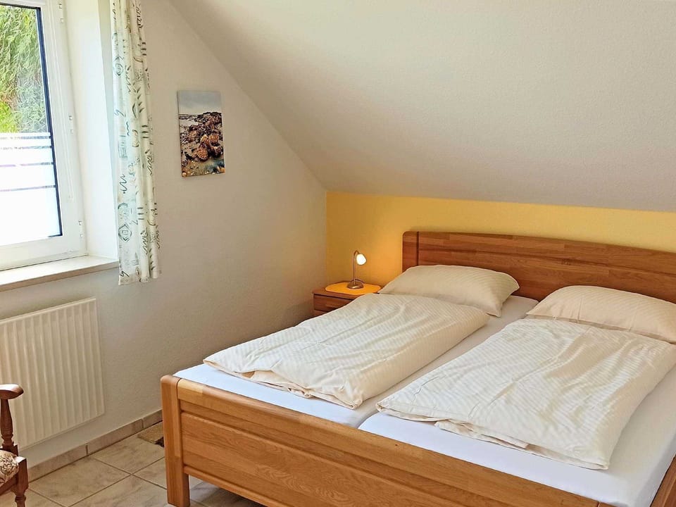 Vacation apartment Luv - Holiday apartments Am alten Deich in the guest house Apartment in Wangerland