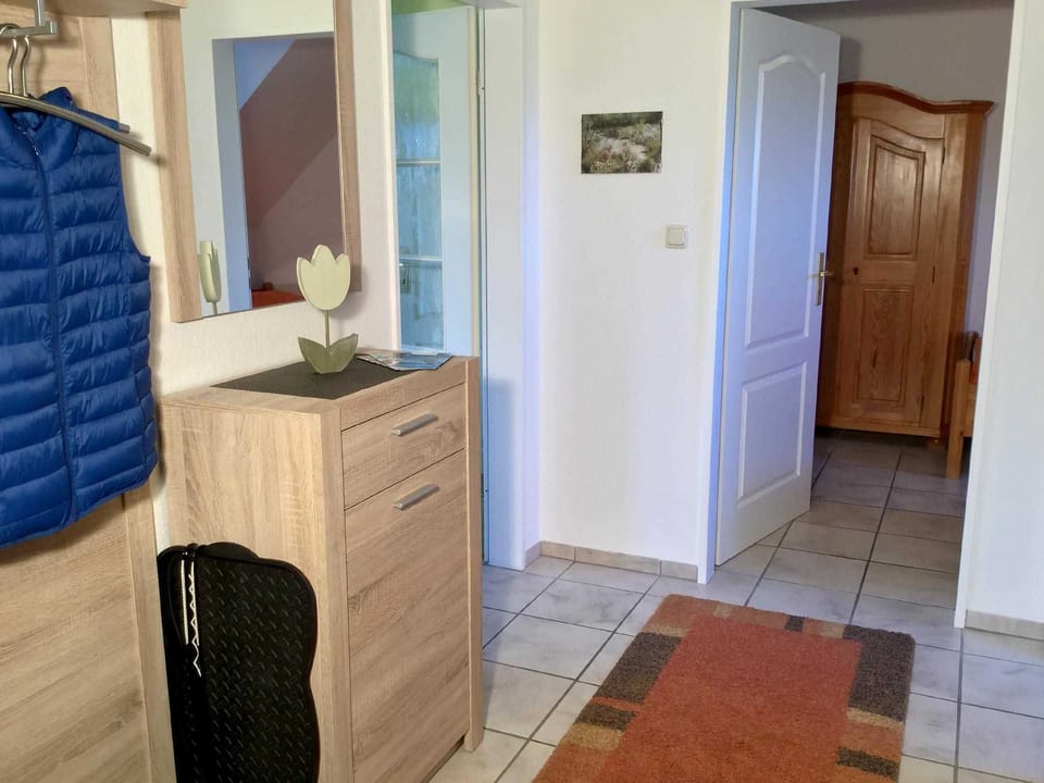 Vacation apartment Luv - Holiday apartments Am alten Deich in the guest house Apartment in Wangerland