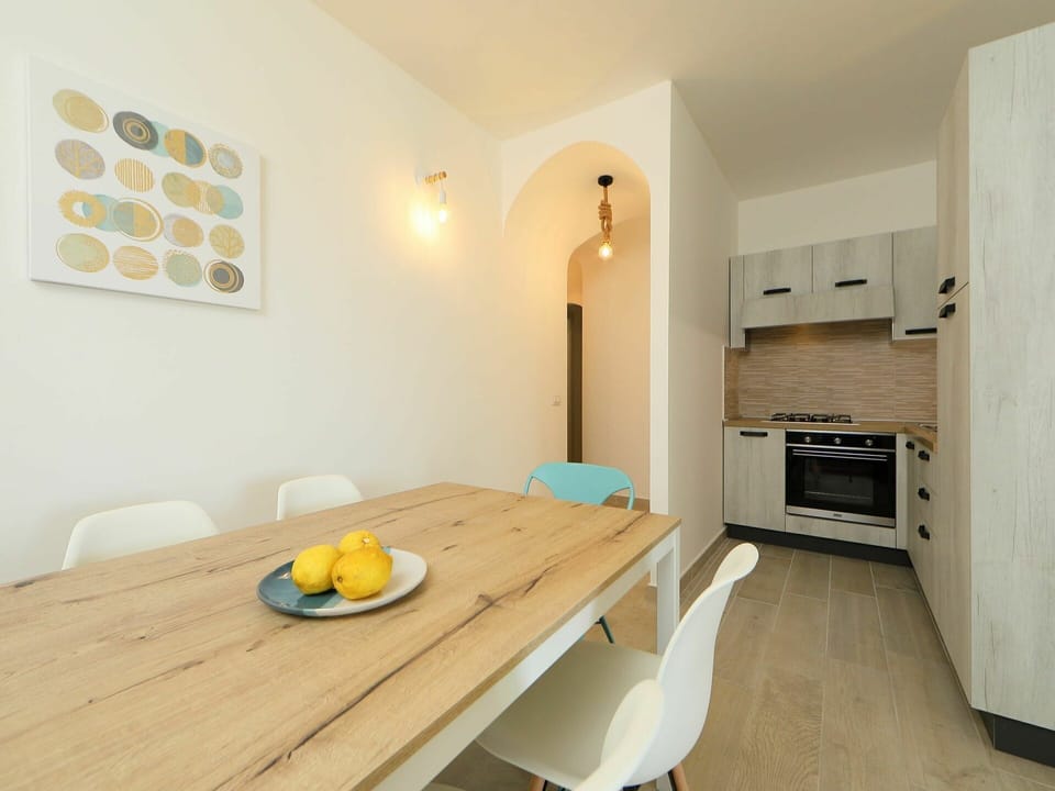 Room, Property, Interior Design, Furniture, Building, Yellow, Floor, House, Ceiling, Table