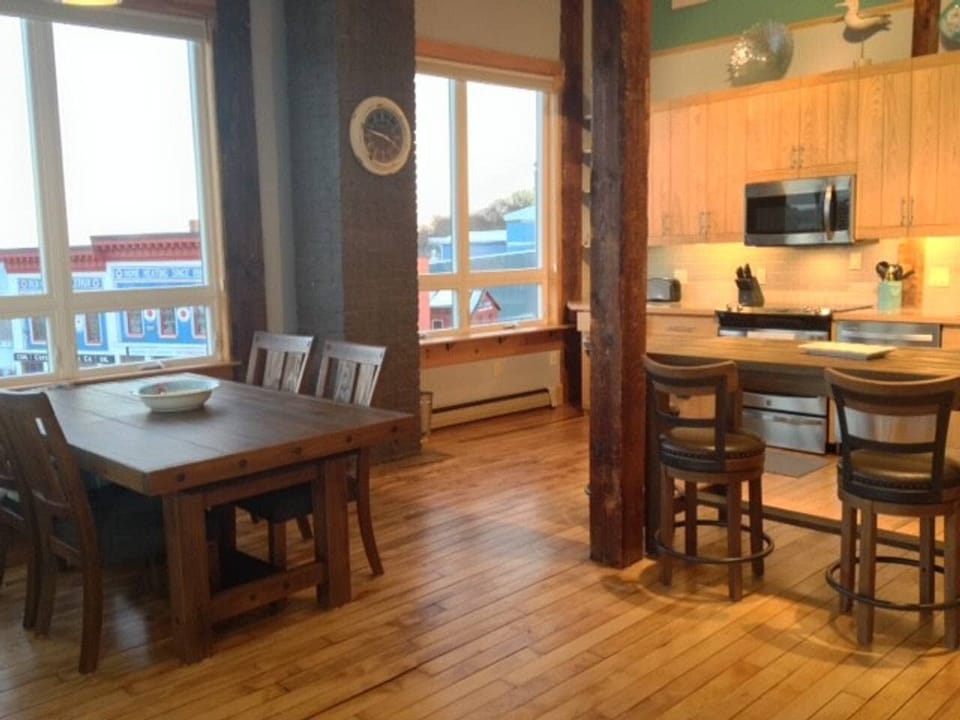Open kitchen/living room floor plan with lots of seating