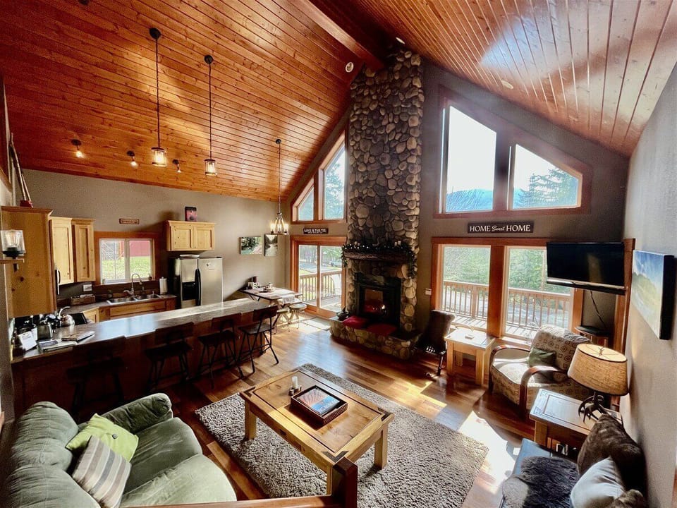 Spacious living area -- Smart TV, DVD player with DVD`s, and a soundbar with bluetooth capability