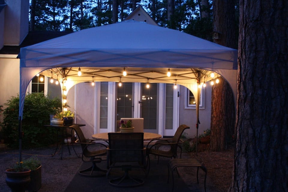 Outdoor Patio - A great place to relax and enjoy the trees.  Shared with Host.