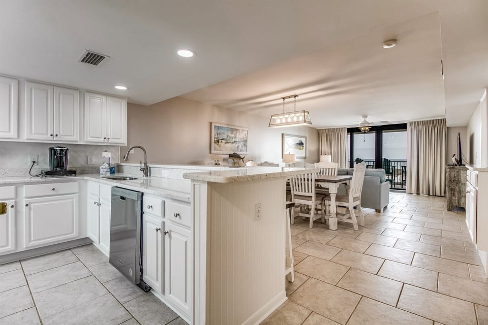 Fully equipped kitchen with modern appliances at Wind Drift Orange Beach