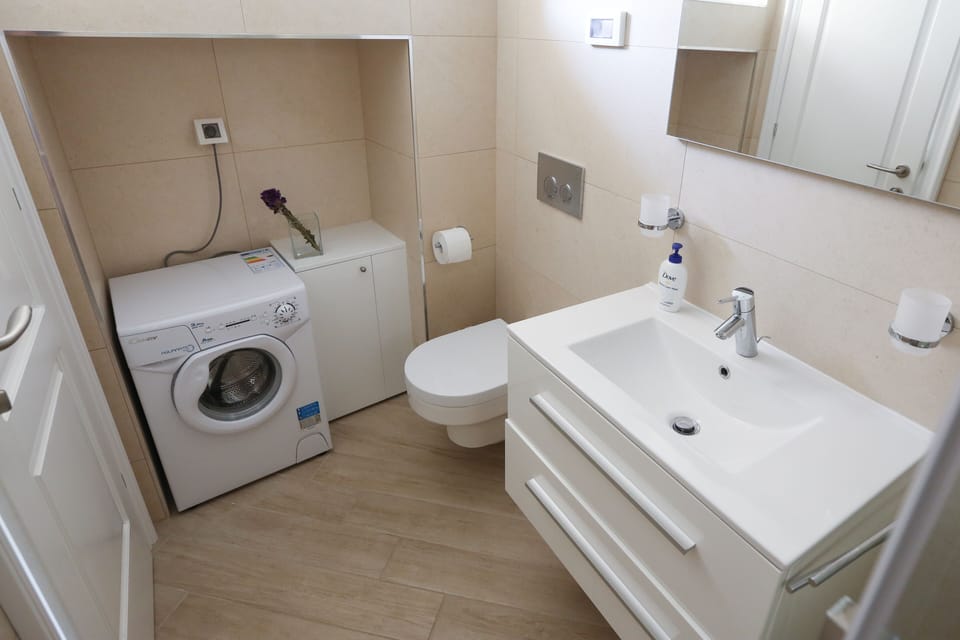 Villa White & Co  |  each unit has its own washmachine so 3 in total