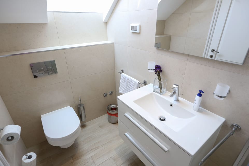 Villa White & Co  | 4 modern bathrooms with  shower cabin, hairdryer and WC