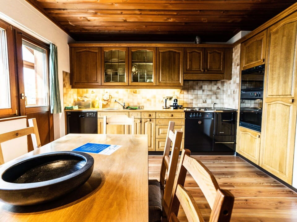 Property, Furniture, Cabinetry, Wood, Countertop, Interior Design, Flooring, Floor, Table, Window