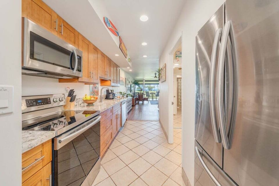 Fully equipped kitchen with modern stainless steel appliances and everything you need