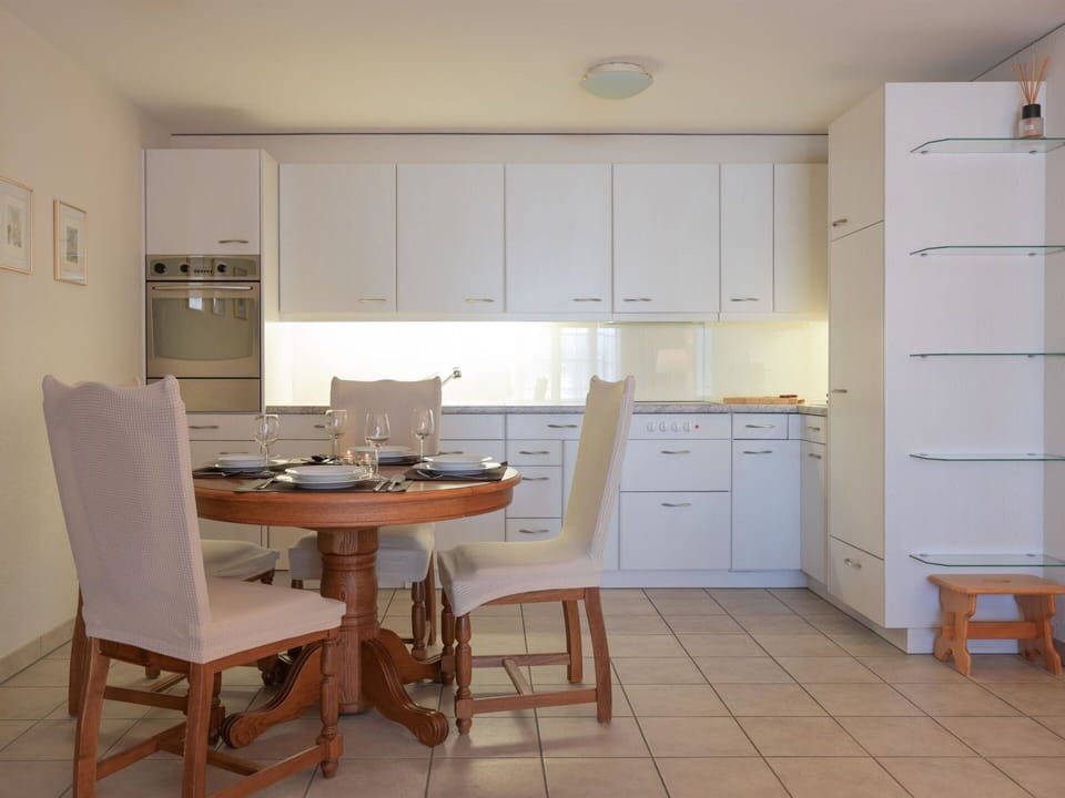 Furniture, Cabinetry, Table, Chair, Building, Wood, Kitchen, Flooring, Floor