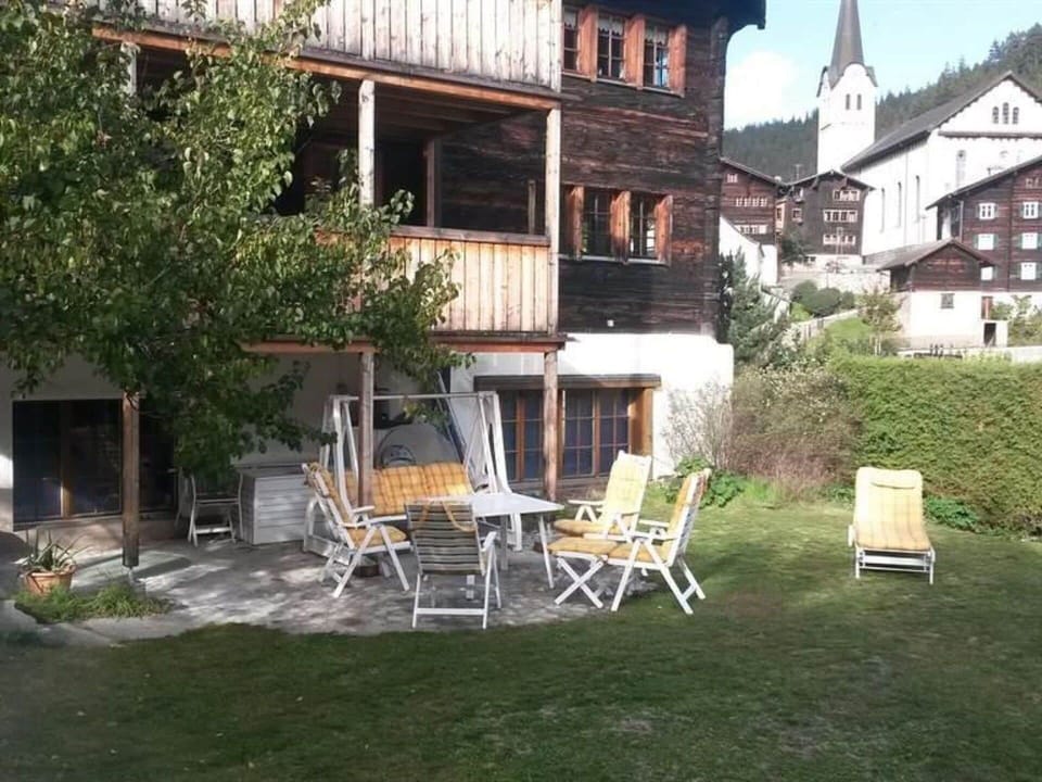 Plant, Building, Property, Window, Table, Chair, Outdoor Table, House, Residential Area, Real Estate