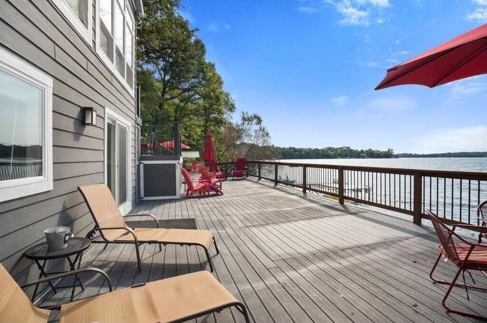 Huge deck right on the water with ample seating and lounging areas.