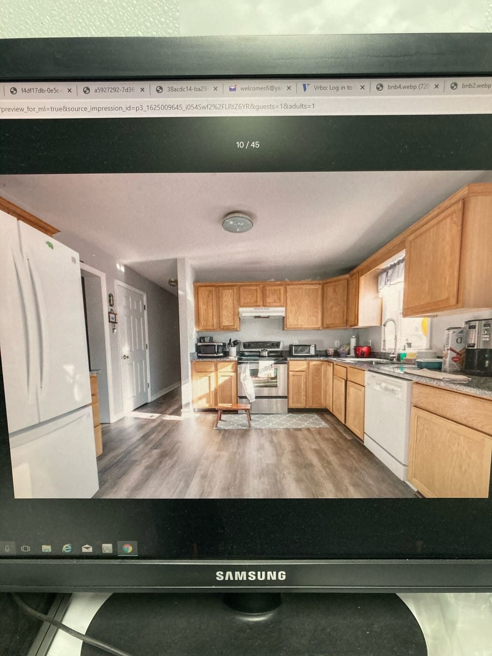 Kitchen, with refrigerator on the left