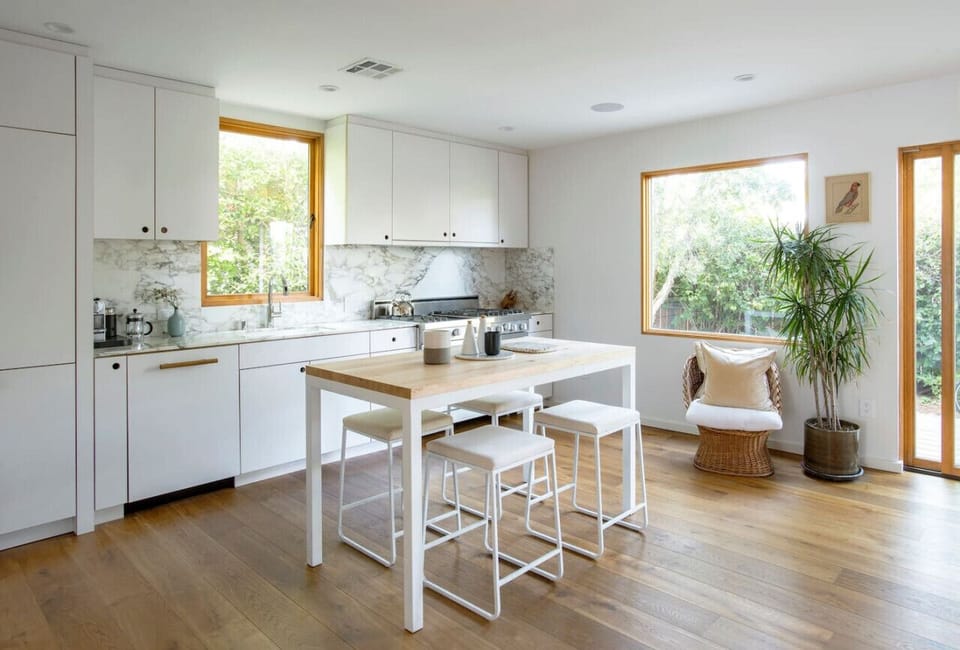 Cozy kitchen dining—perfect for meals with seating for four.