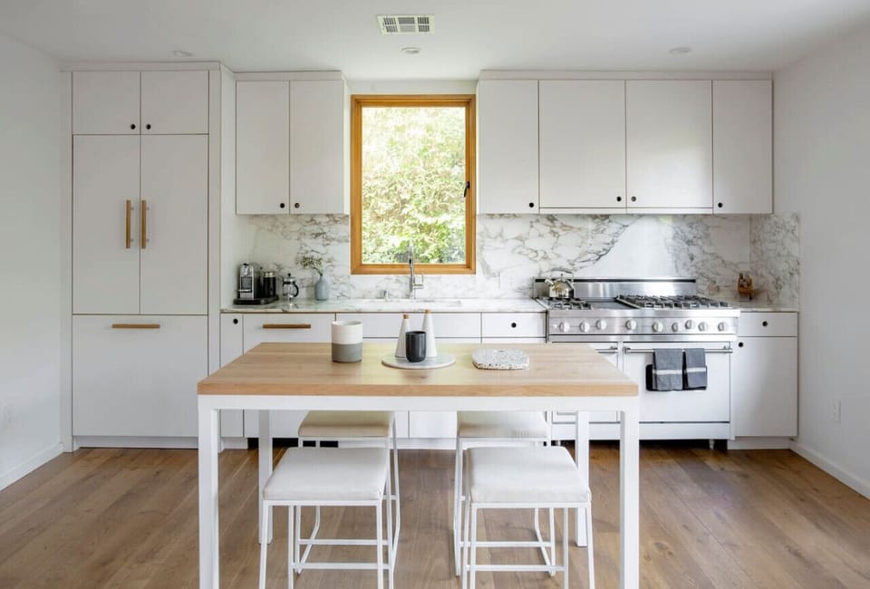 Cozy kitchen dining—perfect for meals with seating for four.