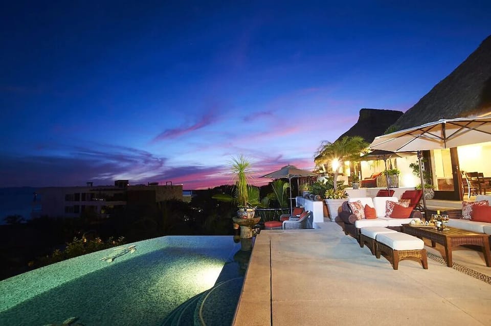 Deck with living space & separate sitting areas. 