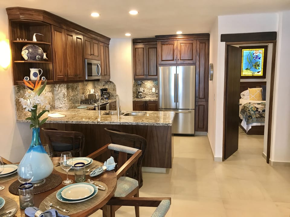 The beautiful kitchen/dining area of La Palapa 501.