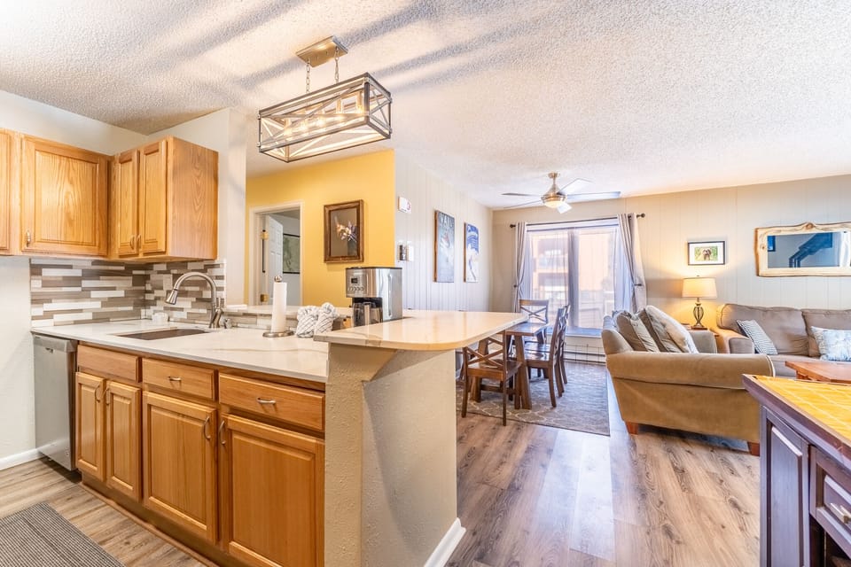 Open concept kitchen, dining and living.