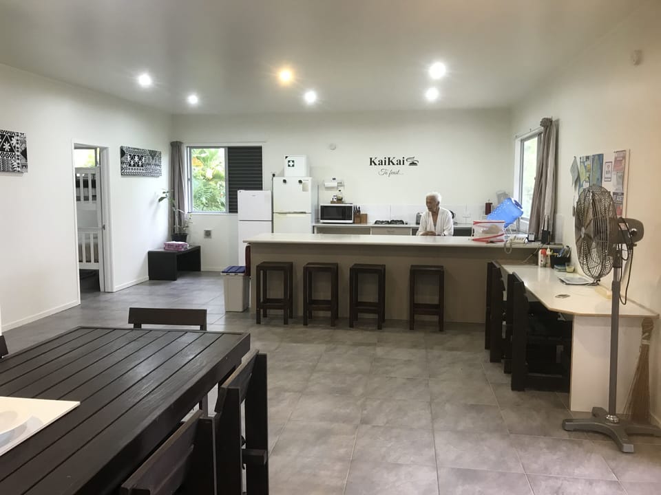 View from dining to the kitchen, with the 3 bedroom to the left. 