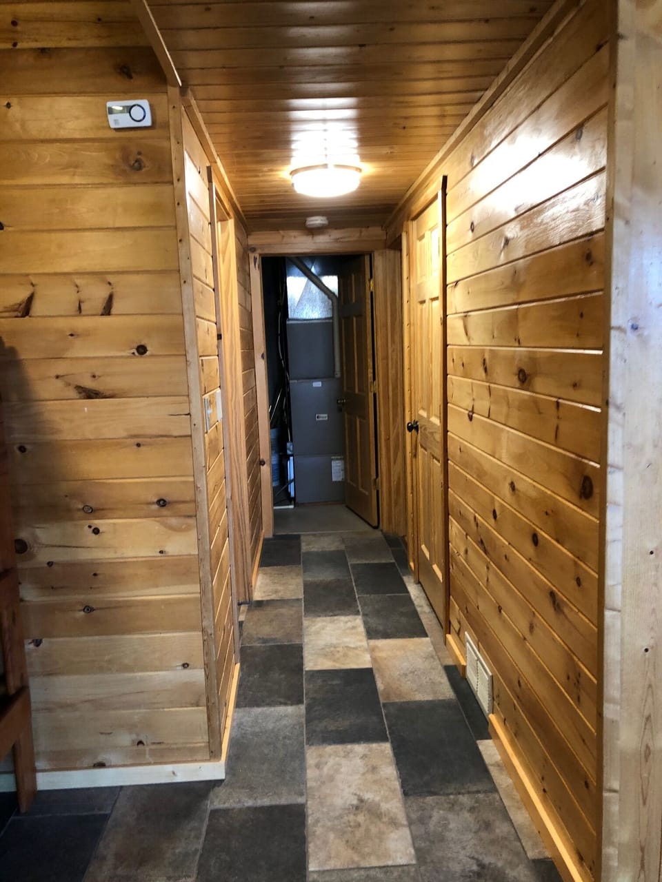Hallway off recreation room to laundry, bedroom #4 and full hall bath.