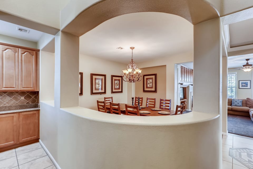 The dinning room from the entry. Mini bar to the left & living room to the right