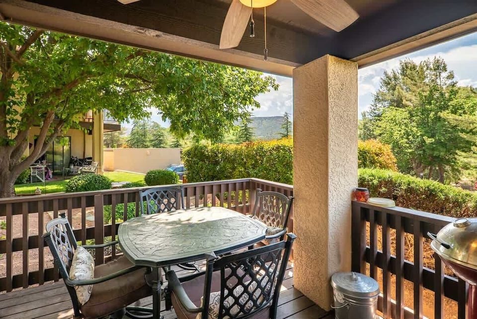 The lower level deck is covered with serene views
