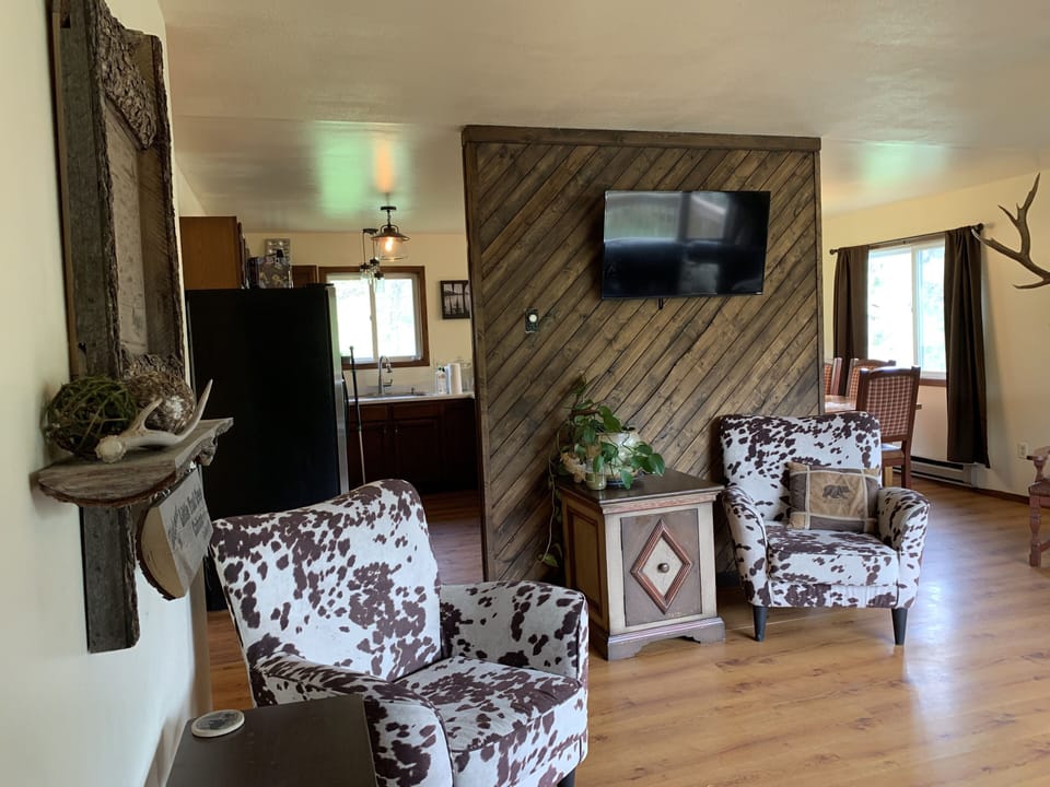 Aspen living room - kitchen on the left & dining room on the right 