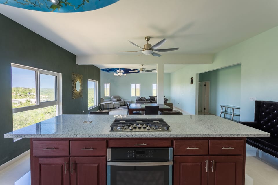 SUNRISE Kitchen view onto the open concept living and dining area