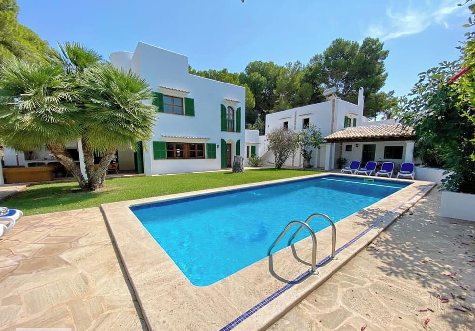 Pool Area with amazing garden, solarium and exterior living area.